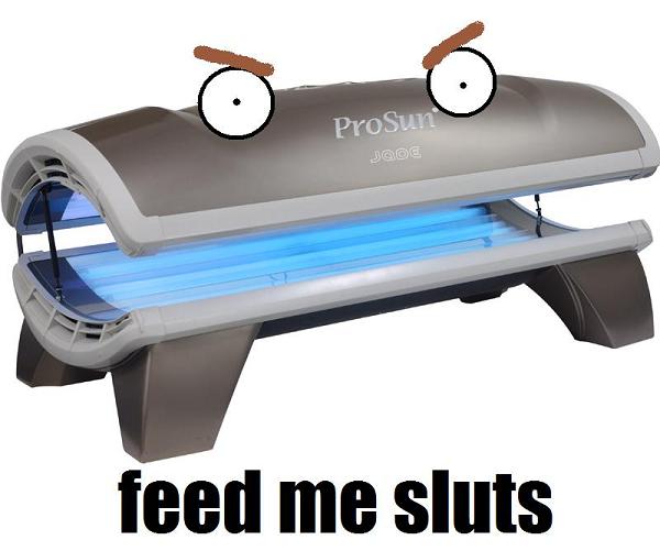 Tanning Bed Says Feed Me Sluts