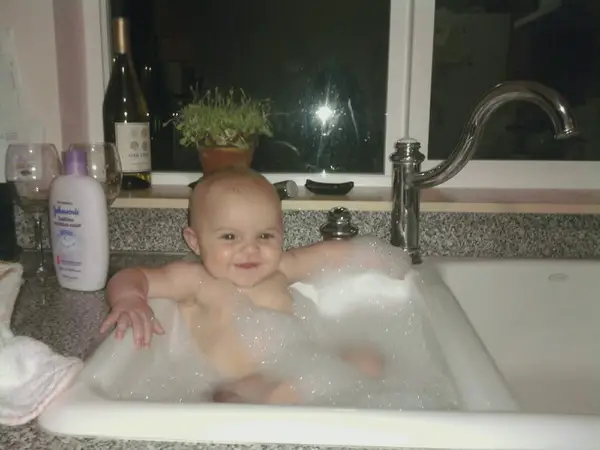 Cute Baby Takes Hot Tub In Sink