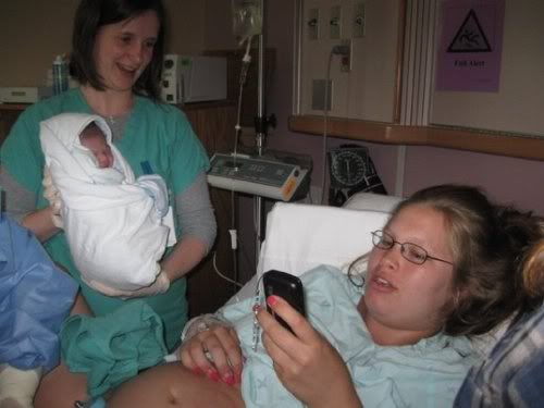 teen has baby wont put down cell phone